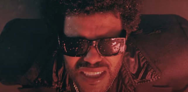 The Weeknd под компьютерным дождем в новом видео на трек «Dancing In The Flames».